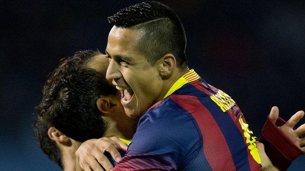 Alexis Sanchez of Barcelona celebrates scoring their opening goal