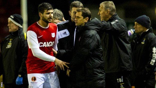 Dundee Utd manager Jackie McNamara (right) consoles Nadir Ciftci after he is sent off