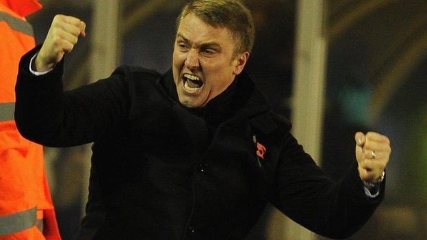 Birmingham manager Lee Clark celebrates their late equaliser against Stoke in the League Cup.