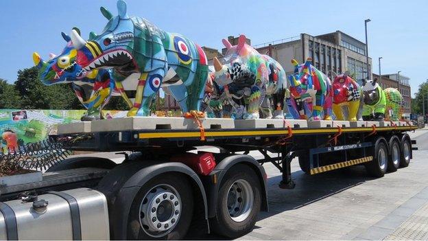 Rhinos on a lorry