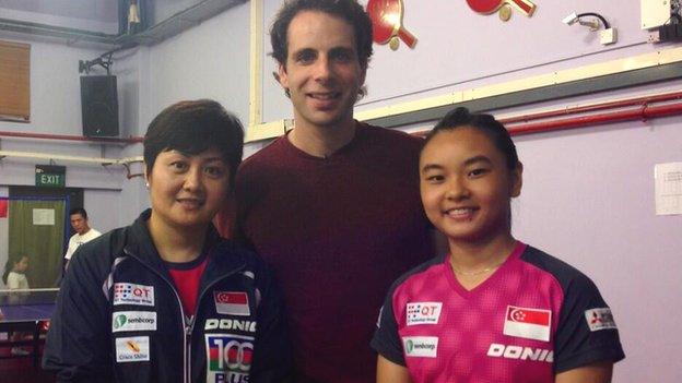 Queen's Baton Relay presenter Mark Beaumont with Isabelle Li and Jing Jun Hong