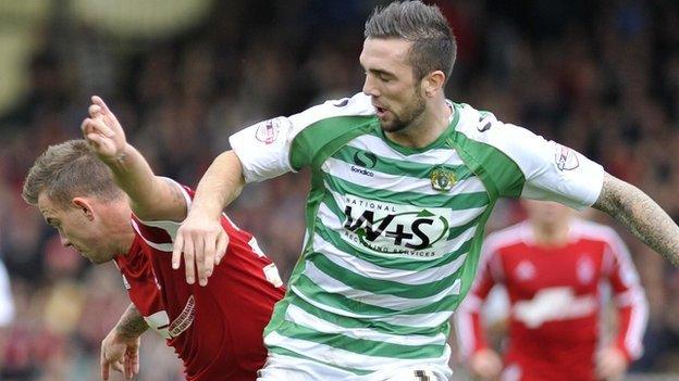 Yeovil's Shane Duffy contests with Nottingham Forest's Simon Cox