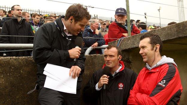 Thomas Niblock with Paddy Bradley and Oisin McConville