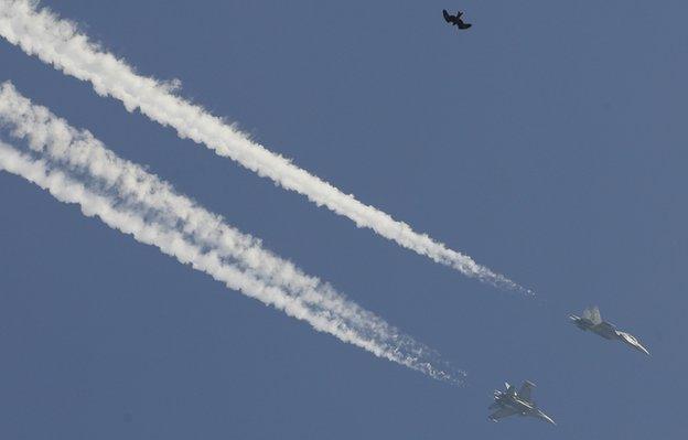 Bird and two planes