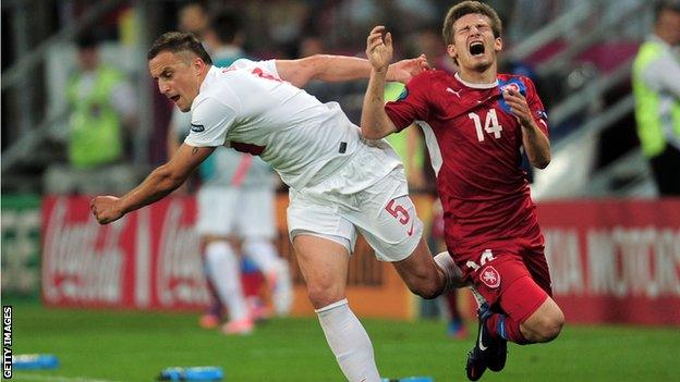 Dariusz Dudka of Poland (right) battles with and Vaclav Pilar of Czech Republic