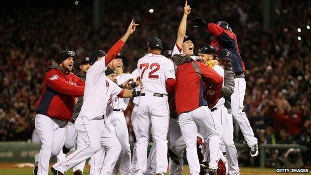 The Boston Red Sox celebrate after defeating the St Louis Cardinals in the 2013 World Series at Fenway Park on in Boston, Massachusetts, on 30 October 2013