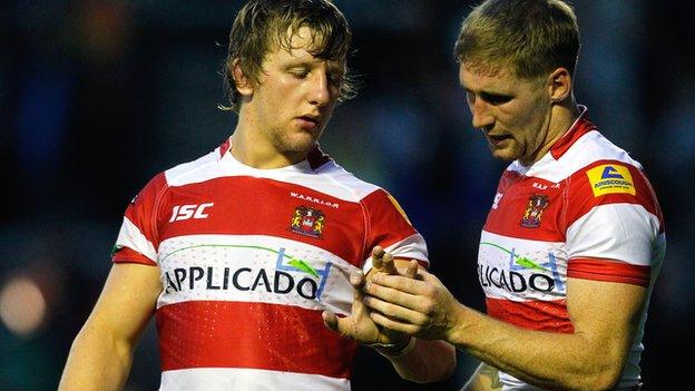 Logan Tomkins and Sam Tomkins