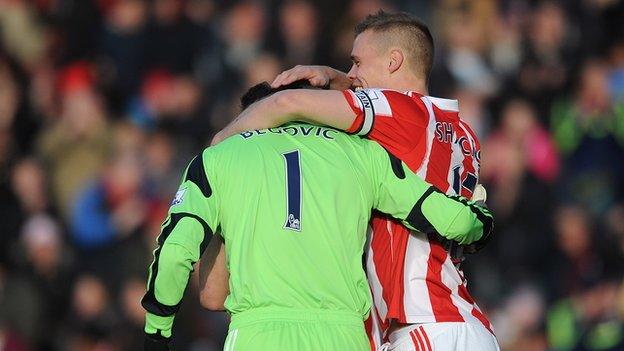 Stoke goalkeeper Asmir Begovic celebrates with defender Ryan Shawcross