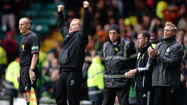 Celtic manager Neil Lennon salutes Charlie Mulgrew's equaliser against Dundee United