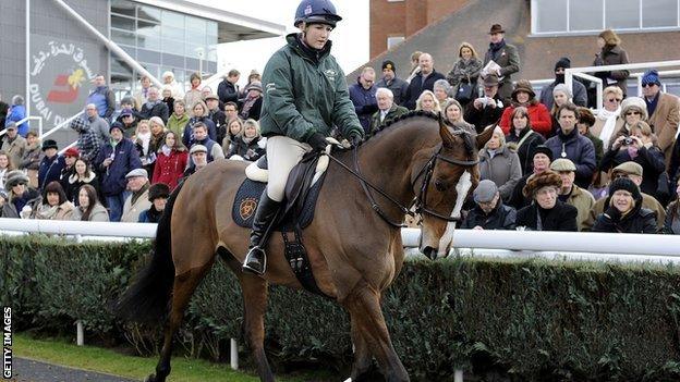 Kauto Star and Laura Collett in the parade ring at Newbury