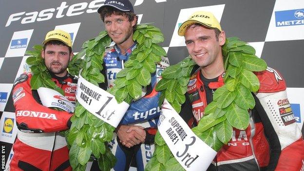 Michael Dunlop, winner Guy Martin and William Dunlop on the podium after the main Superbike race at last year's Ulster GP