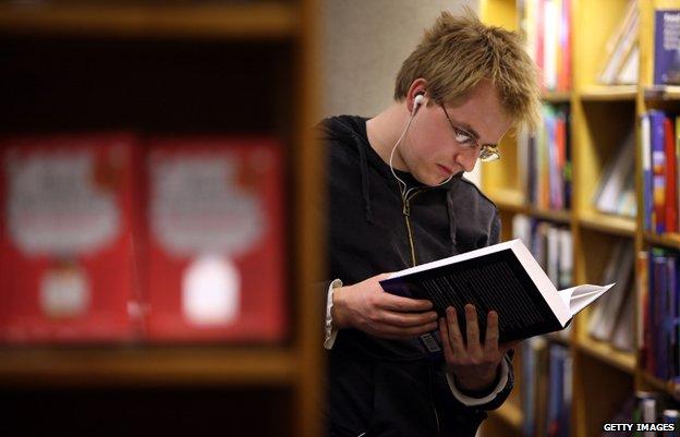 Student reading book