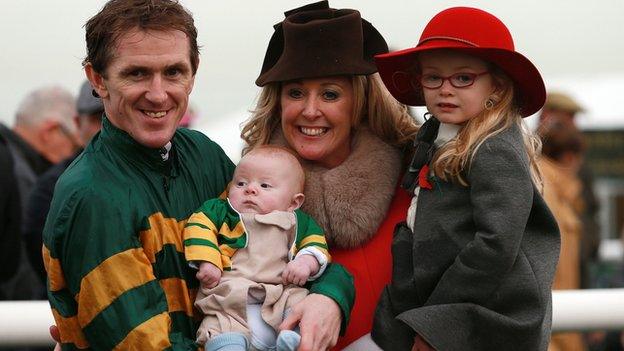 AP McCoy celebrates his 4,000th career win with daughter Eve, son Archie Peter and wife Chanelle at Towcester