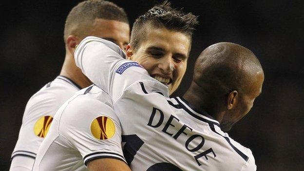 Erik Lamela is congratulated by Jermain Defoe