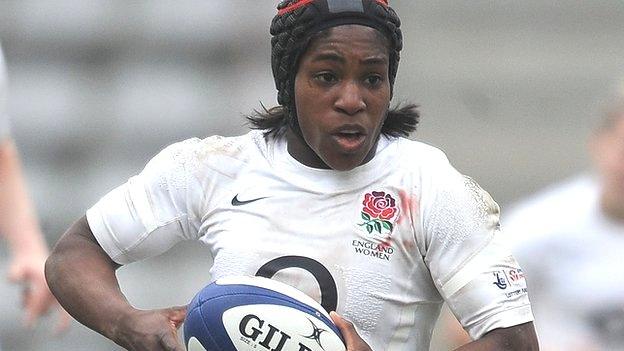 Maggie Alphonsi runs with the ball for England