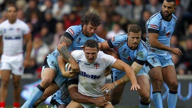 Sam Burgess takes on the Fiji defence