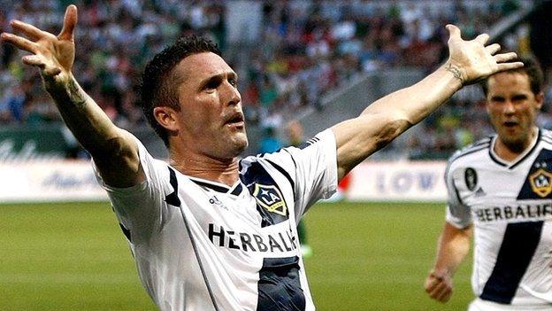 Robbie Keane celebrates with LA Galaxy team-mates