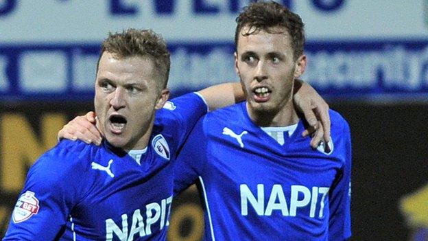 Gary McSheffrey and Jamie Devitt celebrate scoring for Chesterfield