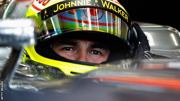 McLaren driver Sergio Perez prepares to drive during practice