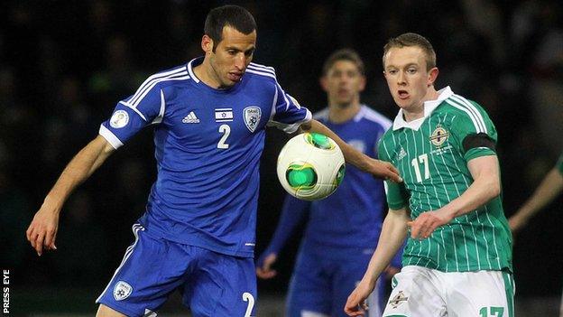 Shane Ferguson (right) in action against Israel in March