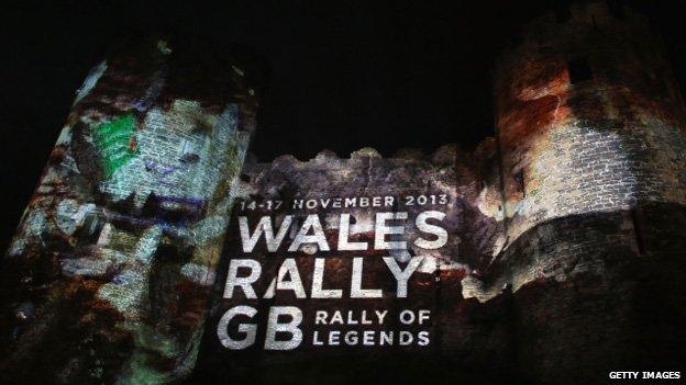 The castle in Conwy lit up for the rally's start on Thursday