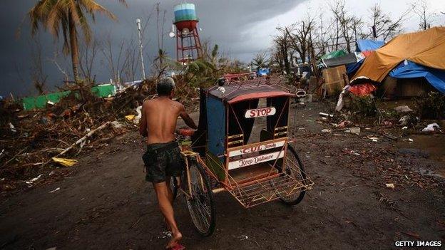 Man pushes a rickshaw, Leyte (14 November)