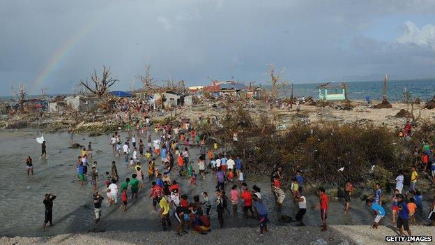 Children play in Guiuan in the aftermath of the typhoon
