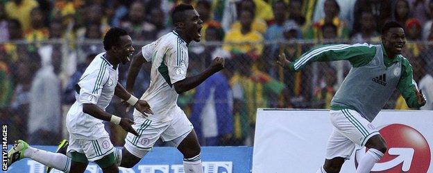 Nigeria's Eddy Onazi, Emmanuel Emenike and James Okwuosa celebrate a goal against Ethiopia