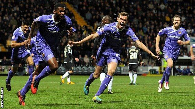 Ethan Ebanks-Landell celebrates his winner for Wolves at Notts County