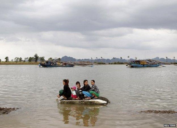 Evacuees in the north Vietnamese province of Quang Ninh, 11 November, after Tropical Storm Haiyan