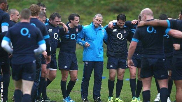 England coach Stuart Lancaster leads his players through training