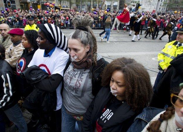 Anti-racism demonstrators shun the Black Pete parade in Amsterdam, 17 December