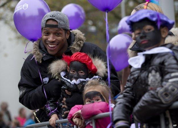 Black Pete revellers in costume in Amsterdam, 17 November