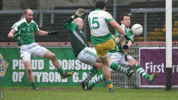 Michael Murphy scores a goal for Glenswilly against Roslea