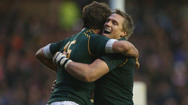 Willie Le Roux and South Africa captain Jean de Villers celebrate