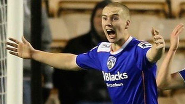 Danny Philliskirk celebrates scoring against Wolves