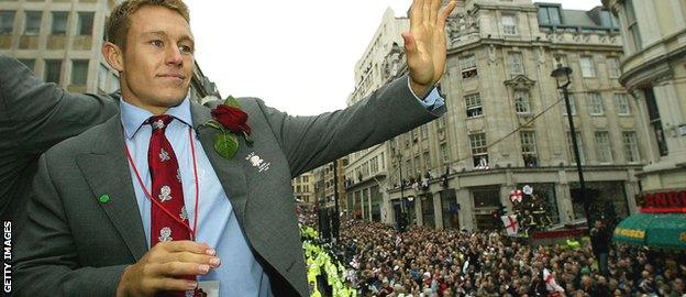 Jonny Wilkinson acknowledges the crowd who turned out to greet England's World Cup winners in London in December 2003