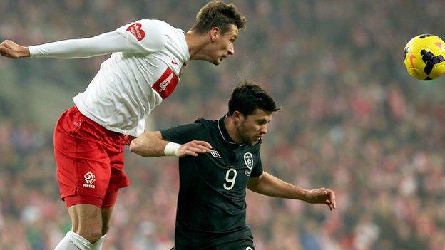 Lukasz Szukala and Shane Long in aerial combat