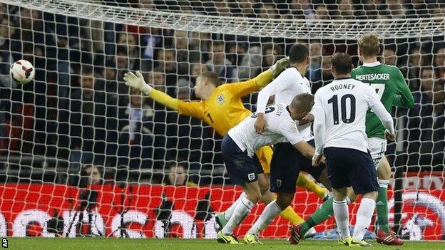 Joe Hart is beaten by Per Mertesacker's header