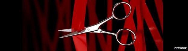 Scissor and red tape