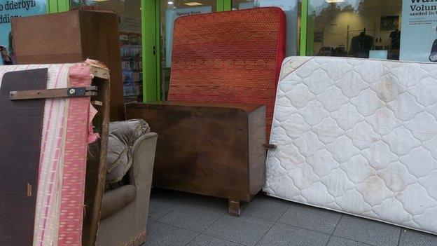 Unwanted items left outside the Barnardos shop in Ammanford