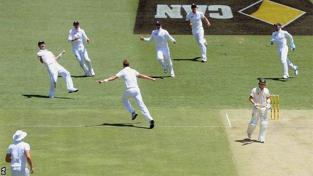 England celebrate after dismissing Michael Clarke