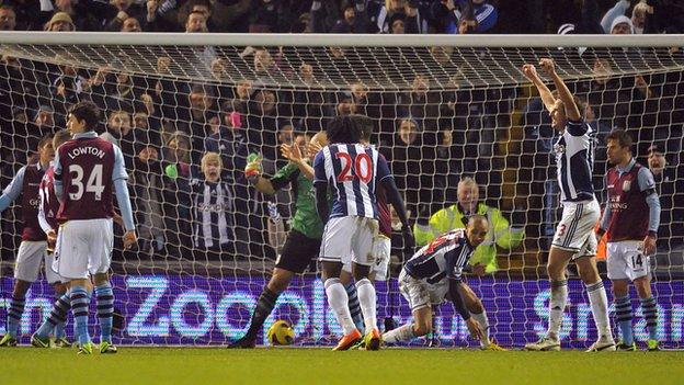 Villa right-back Mattt Lowton looks away in disgust after Peter Odemwingie's late equaliser in January at The Hawthorns