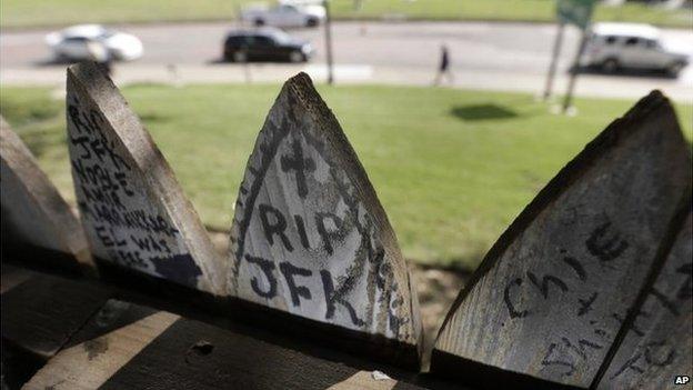 Graffiti on picket fence overlooking Dealey Plaza in Dallas, 19 November 2013