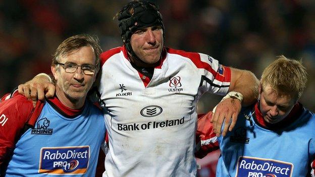 Ferris (centre) is helped off after sustaining his ankle injury in a game against Edinburgh last November