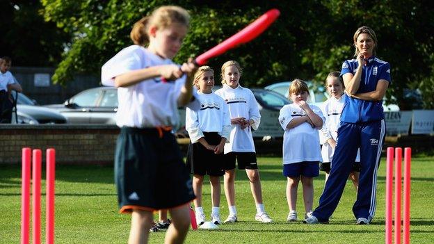 England's Charlotte Edwards taking a cricket session with schoolgirls