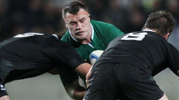 Cian Healy is tackled during the last clash between the teams in June 2012 when the All Blacks won 60-0