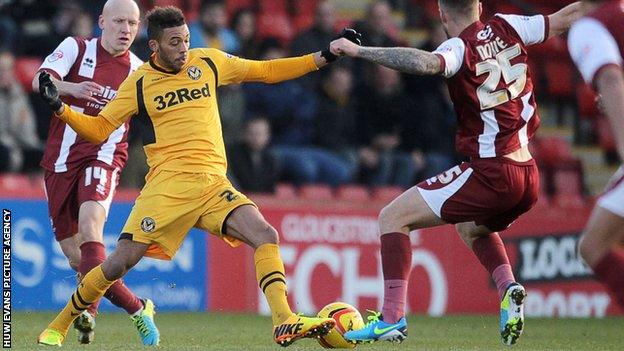 Action from Cheltenham Town v Newport County