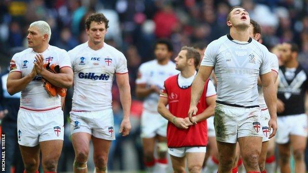 Disconsolate England players after defeat to New Zealand in the 2013 Rugby League World Cup semi-final at Wembley