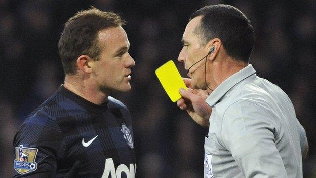 Wayne Rooney gets booked